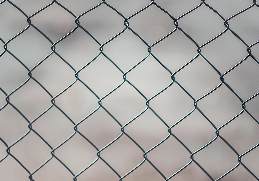 Galvanized chain link fence on a commercial property in Austin