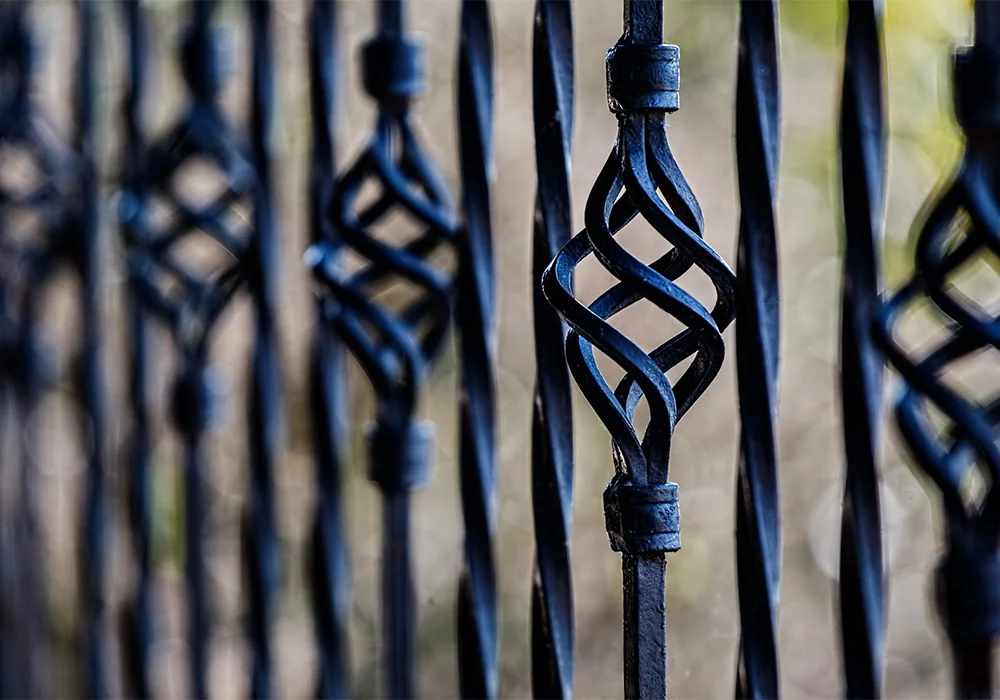 Decorative ornamental iron fence with pointed pickets in Austin