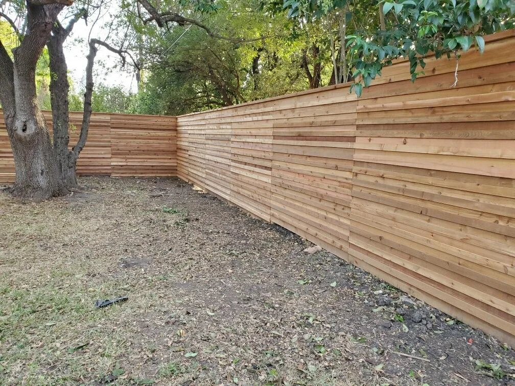 Custom cedar wood privacy fence installed by Allied Fence & Security in Austin